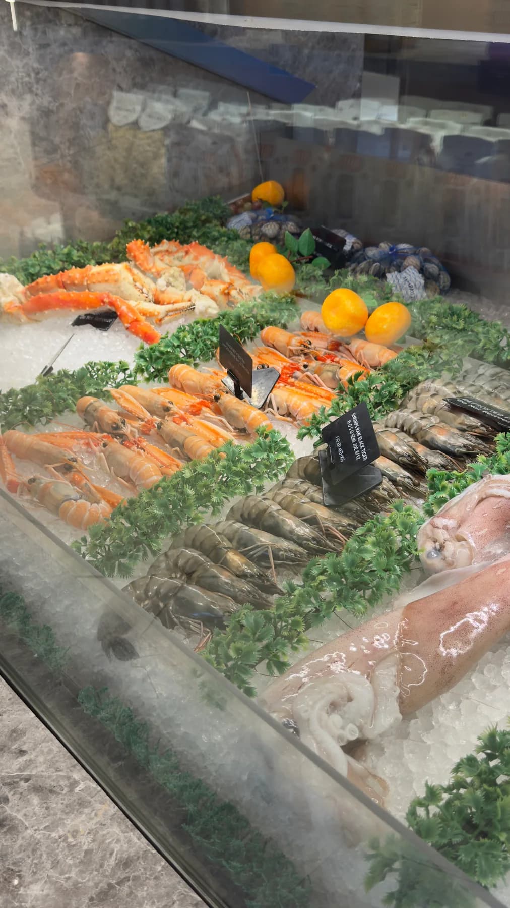 Prawns, crab and squid displayed at Prime Gourmet's seafood counter