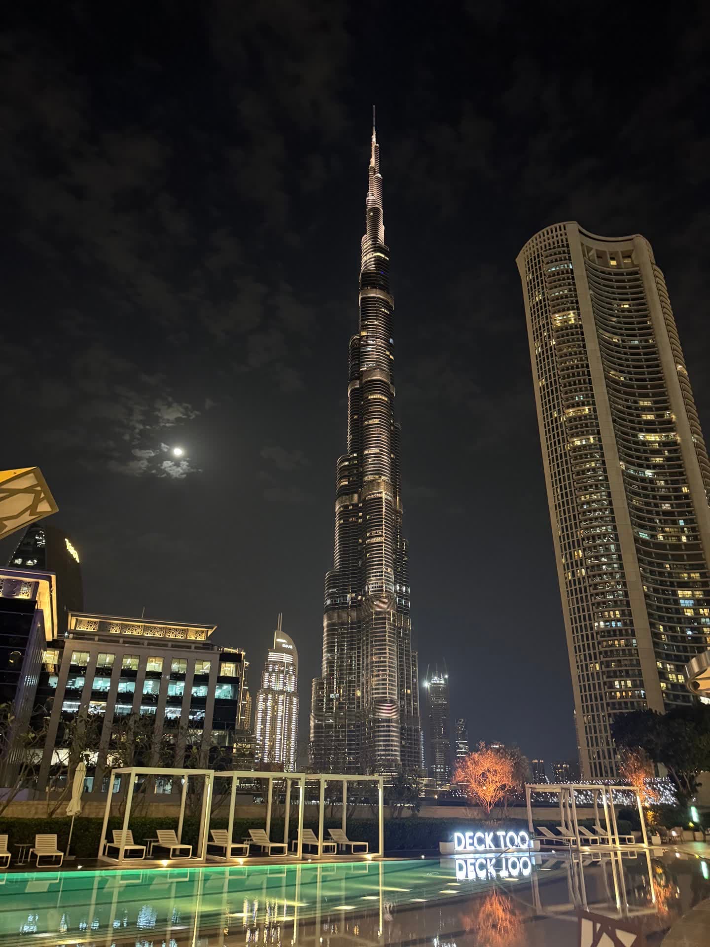 A high-rise pool and Downtown skyline set the tone for an evening in Dubai.