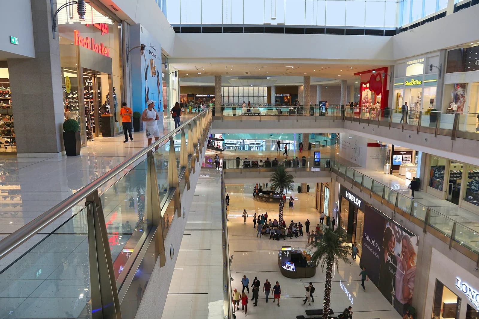 Palm trees and shops inside Dubai Mall