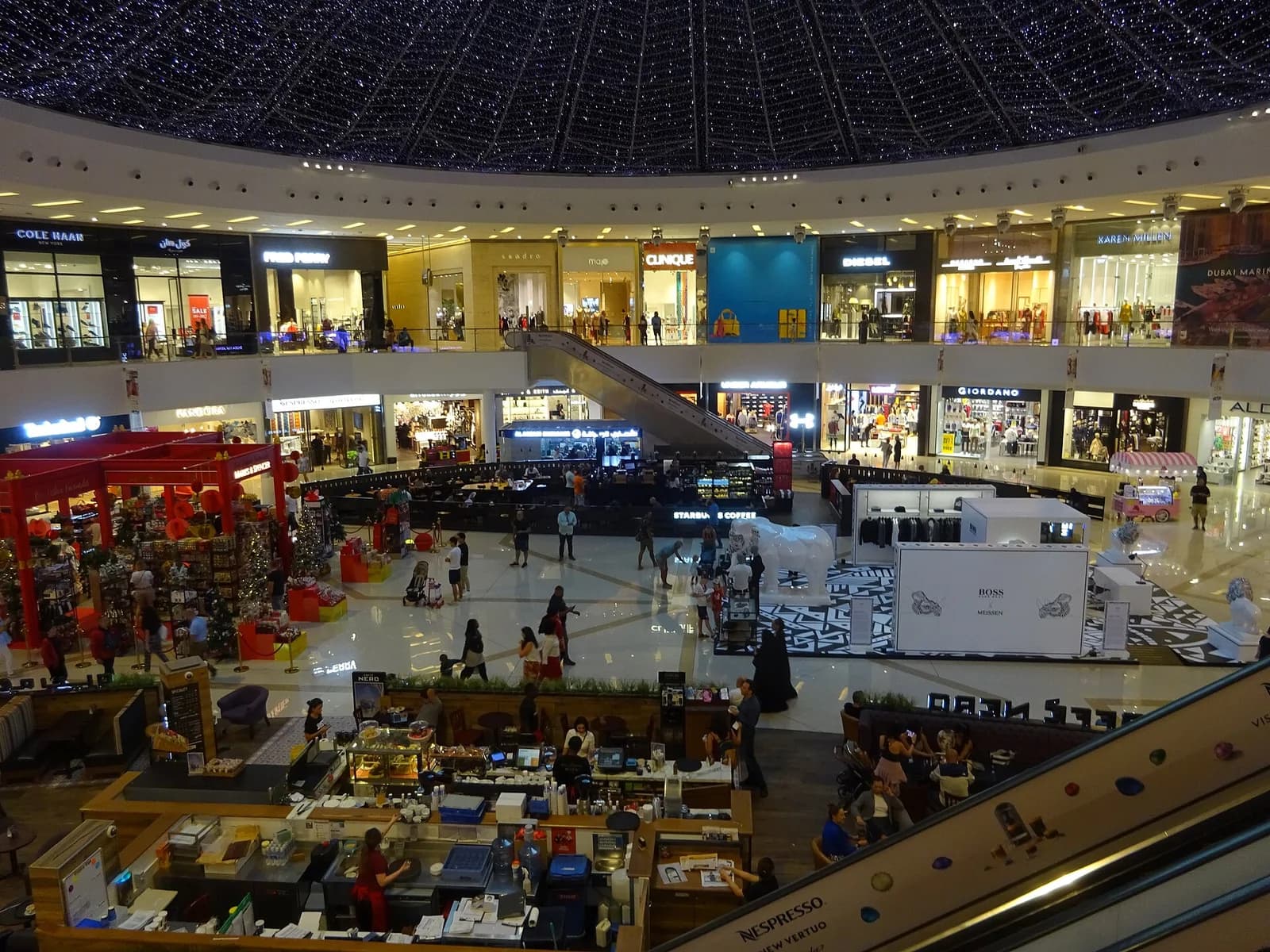 Shops around the atrium inside Dubai Marina Mall